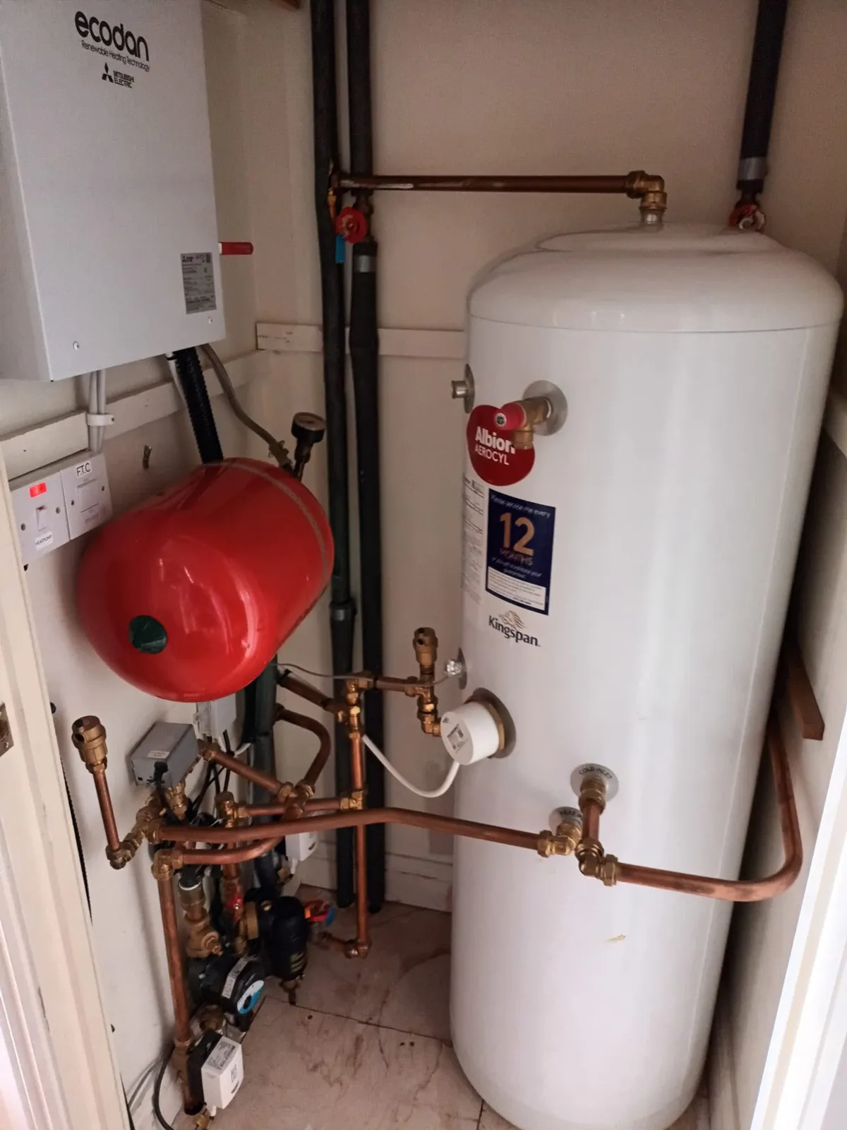One of our recent jobs: an unvented hot water cylinder plumbed into a hot press, with heat pump pipework and expansion vessel.